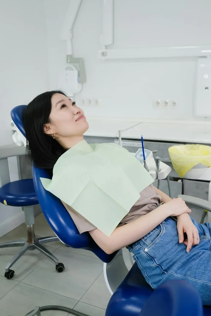 Patient reclining comfortably in a dental treatment chair at Taki Dent — the calm, professional treatment environment described by UK patients in their stories